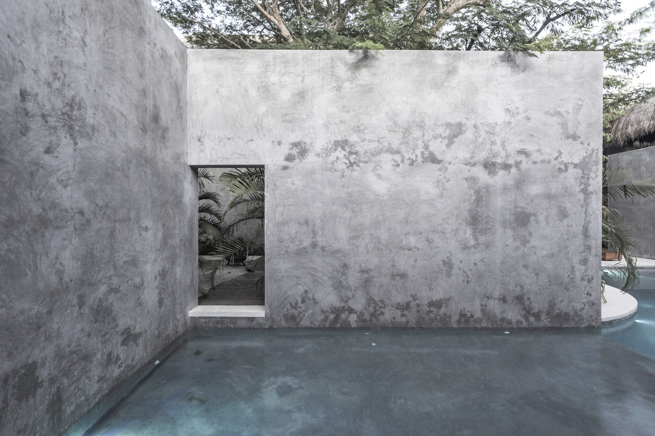 This jungle sanctuary opened in August of 2020 with 18-rooms, a spa, a restaurant/bar and a pool. Its design acknowledges the beauty of imperfection and takes inspiration from Morocco by incorporating handmade artisanal objects and aesthetics throughout the property.