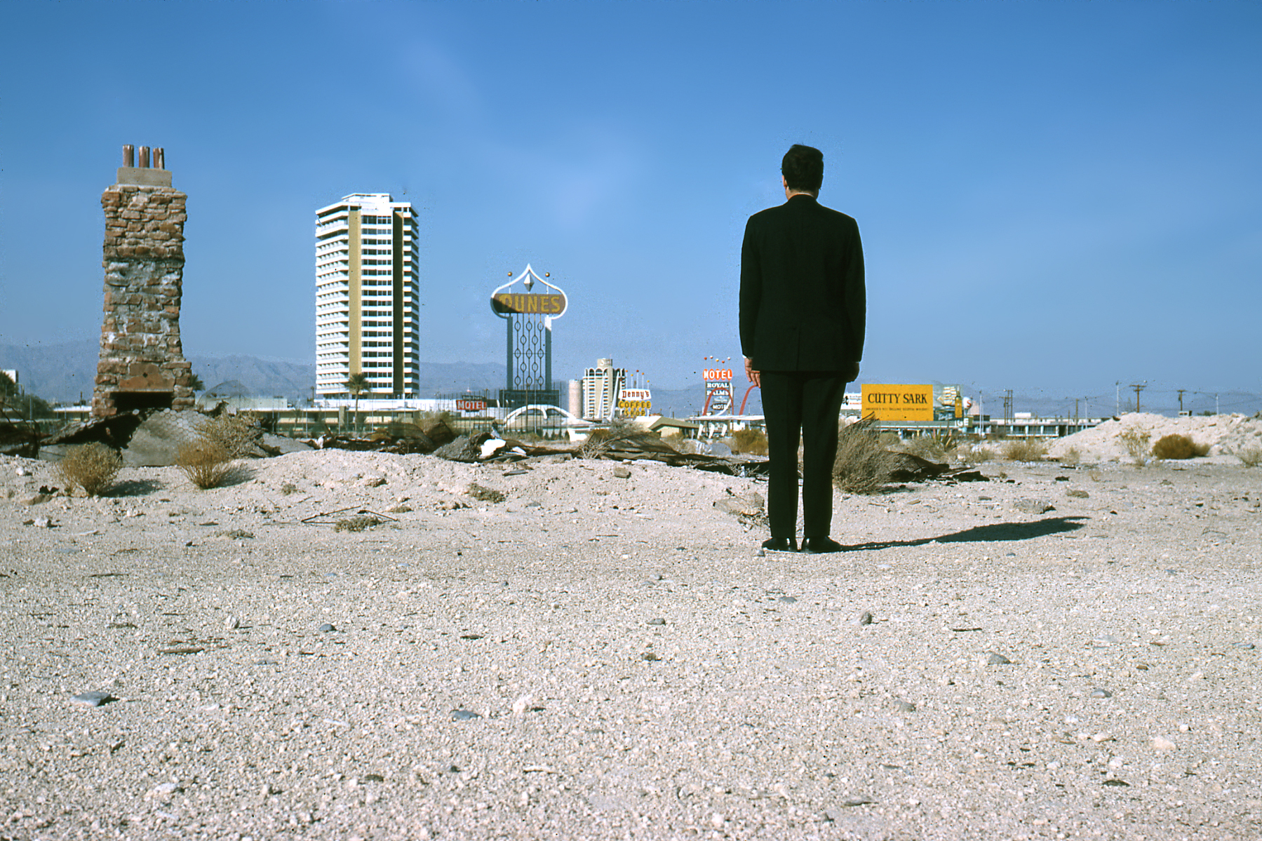 Standing below the title was an iconic image, circa 1965, of the indefatigable architect and planner herself, hands on hips, legs astride a broken-white, highway line &ndash; with the Las Vegas Strip looming in the background.