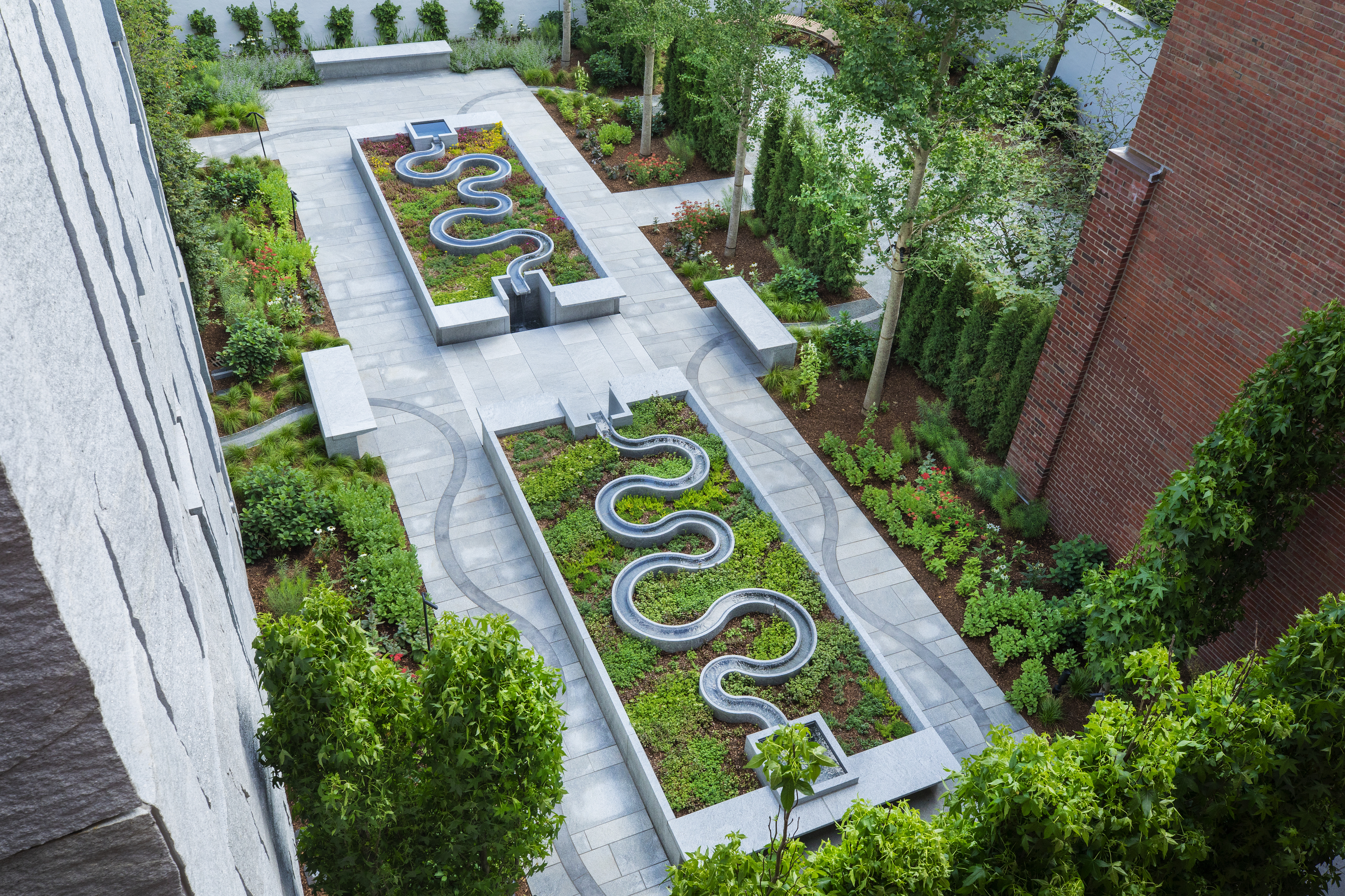 The garden works with the history of the museum and the collections within it – including a new wing by Ennead Architects.