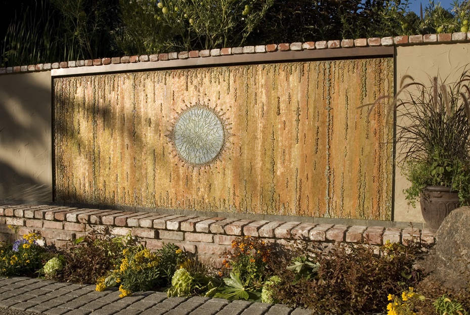 She began to experiment, laminating it onto a painted cement board with clear glue.